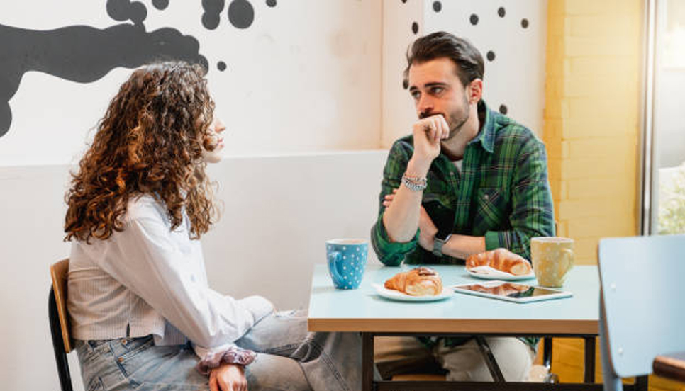 man and woman in a deep discussion