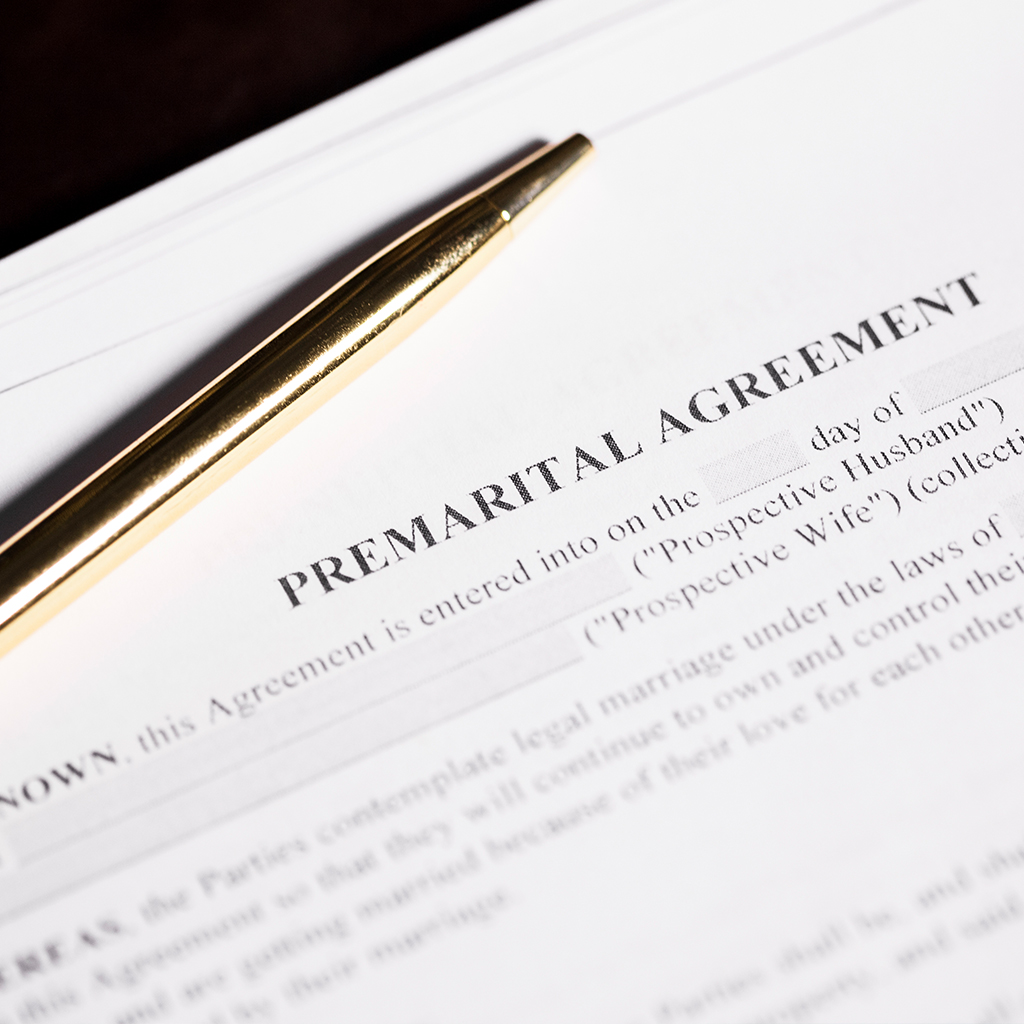 Prenuptial Agreement and a gold pen